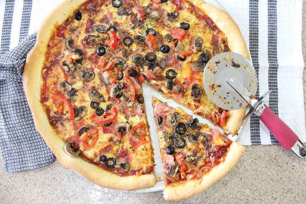 Overhead view showing the melted toppings on the classic pizza crust.