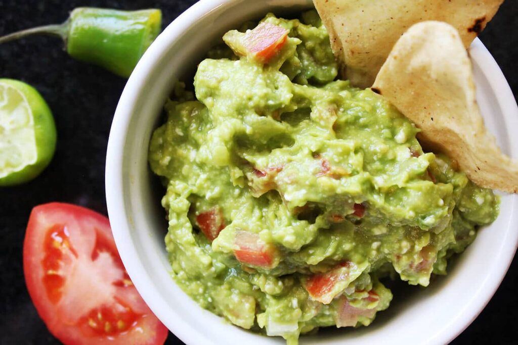 Overhead view looking directly down onto the fresh Mexican guacamole mix.