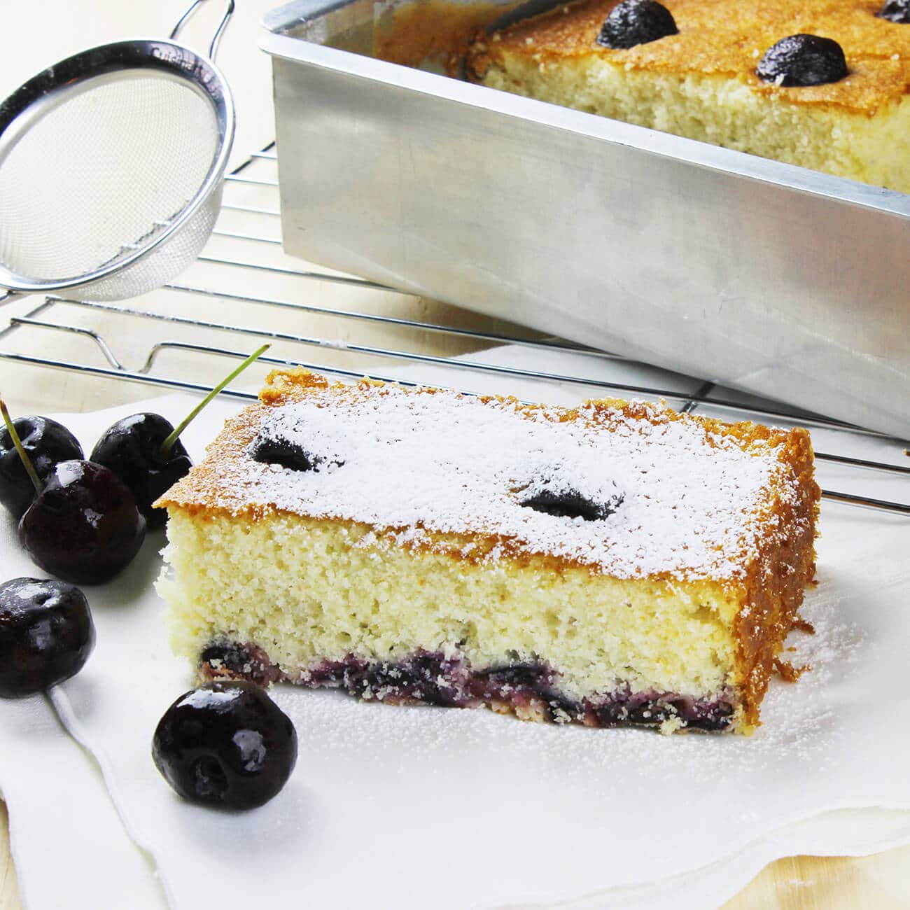 Photograph of the recipe for a classic sponge vanilla cherry cake.