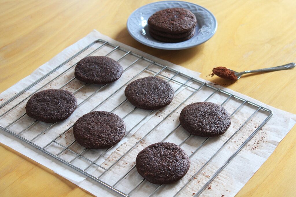 Side perspective showcasing the thickness and fudgy texture of the brownie cookies.
