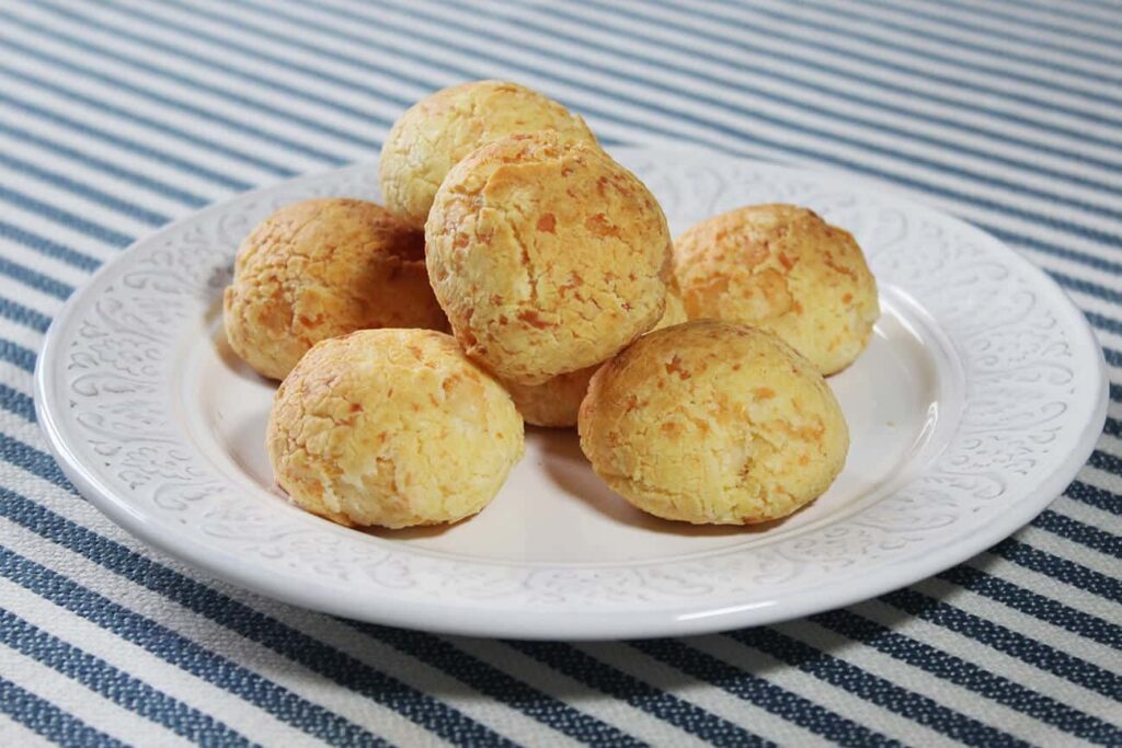 Side perspective displaying the airy puffed shape of the hot yucca bread pieces.