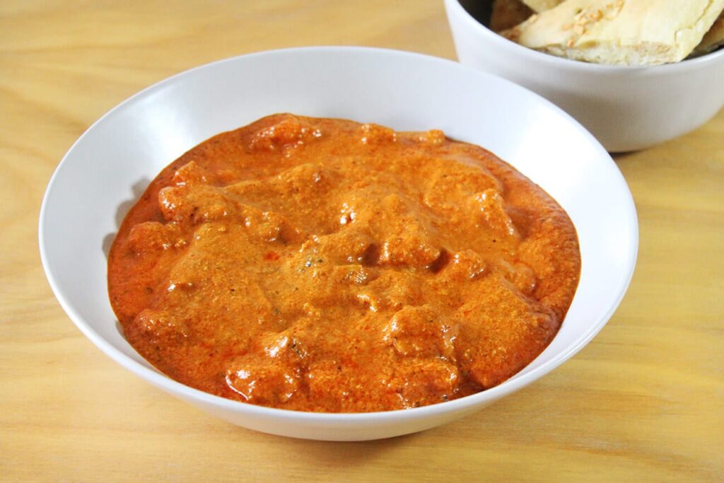 Side perspective displaying a served portion of the easy butter chicken recipe.