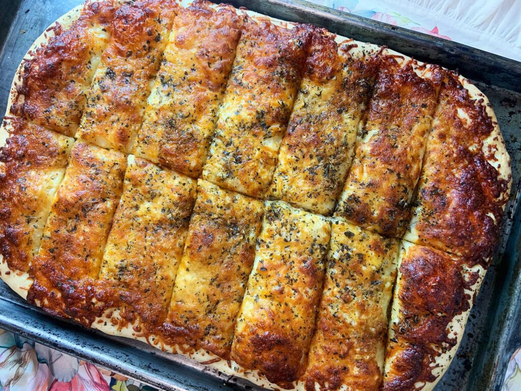 Pan con queso gratinado