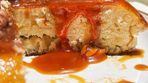 Close-up view focusing on the golden surface of the giant pancake crust.